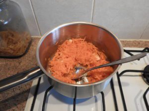 chopped carrot and onion in a pan