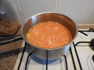 vegetables and rice covered in stock