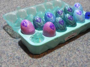 Open 12 pack of Hatchimals, close up