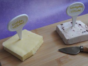 Vegan cheeses with porcelain markers for labels