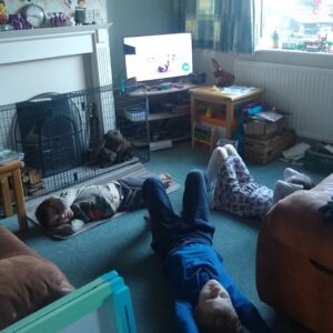 family completing Joe Wicks workout