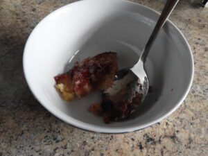 gluten free vegan jam sponge pudding dished up