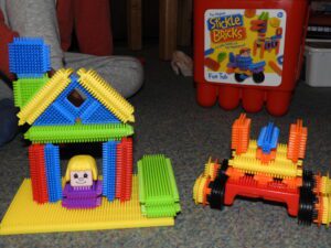 House and car made out of Stickle Bricks