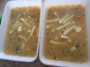 Leftover portions of egetable soup with pasta