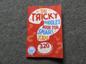 The Tricky Riddles Book For Smart Kids book cover